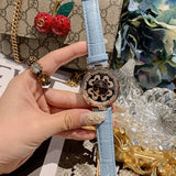 Rotatable Dial Four-Leaf Pattern Women's Watch