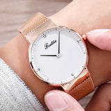Women's Watch Black gilt dial milan strap simple couple watch